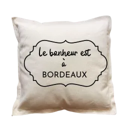 Coussin carré beige personnalisé destination : Le bonheur est à ...