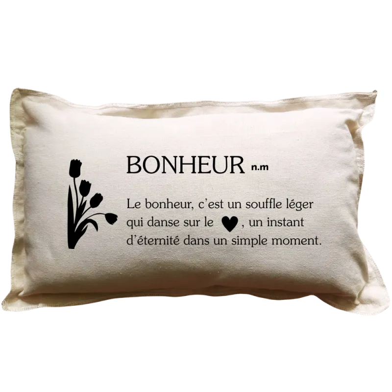 Coussin rectangulaire beige avec la définition du mot : Bonheur